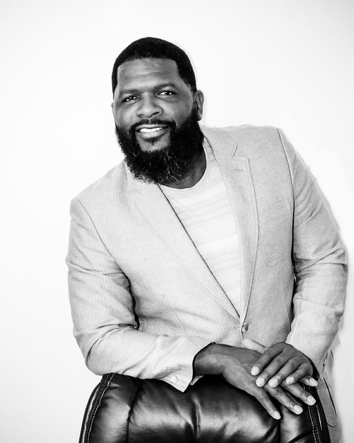 Antonio Stroman, President and CEO of The Brass Effect, delivering a message about the company's mission, commitment, and vision for empowering businesses through IT, Security, Infrastructure, and A/V solutions.